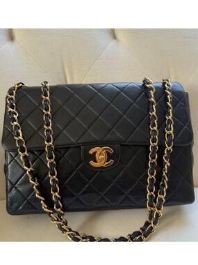 Vinatge Chanel Black Quilted Leather 24k gold plated hardware jumbo Flap Bag
